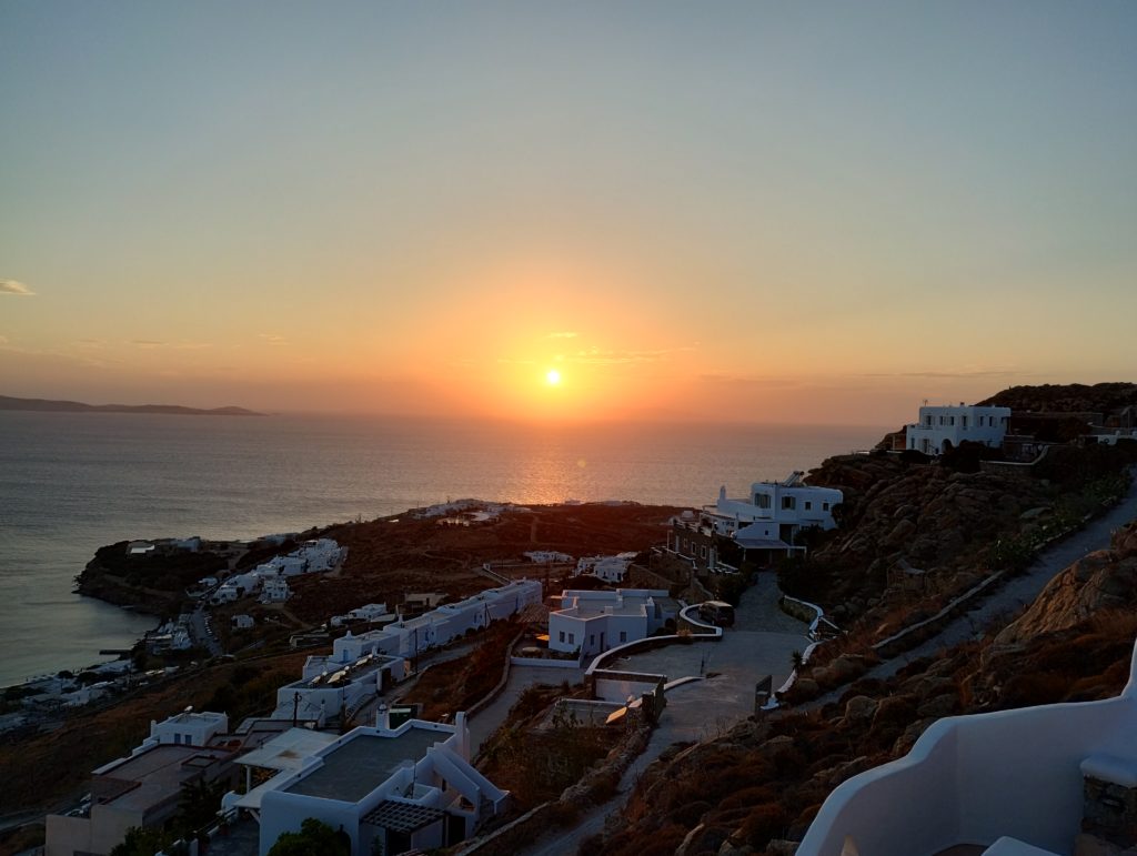 the sun sets on our return to the cyclades